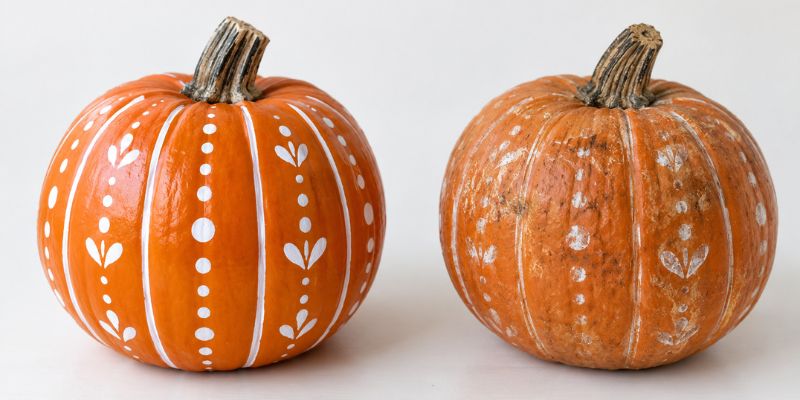 Fresh marker design on a pumpkin next to the same design after weeks outdoors